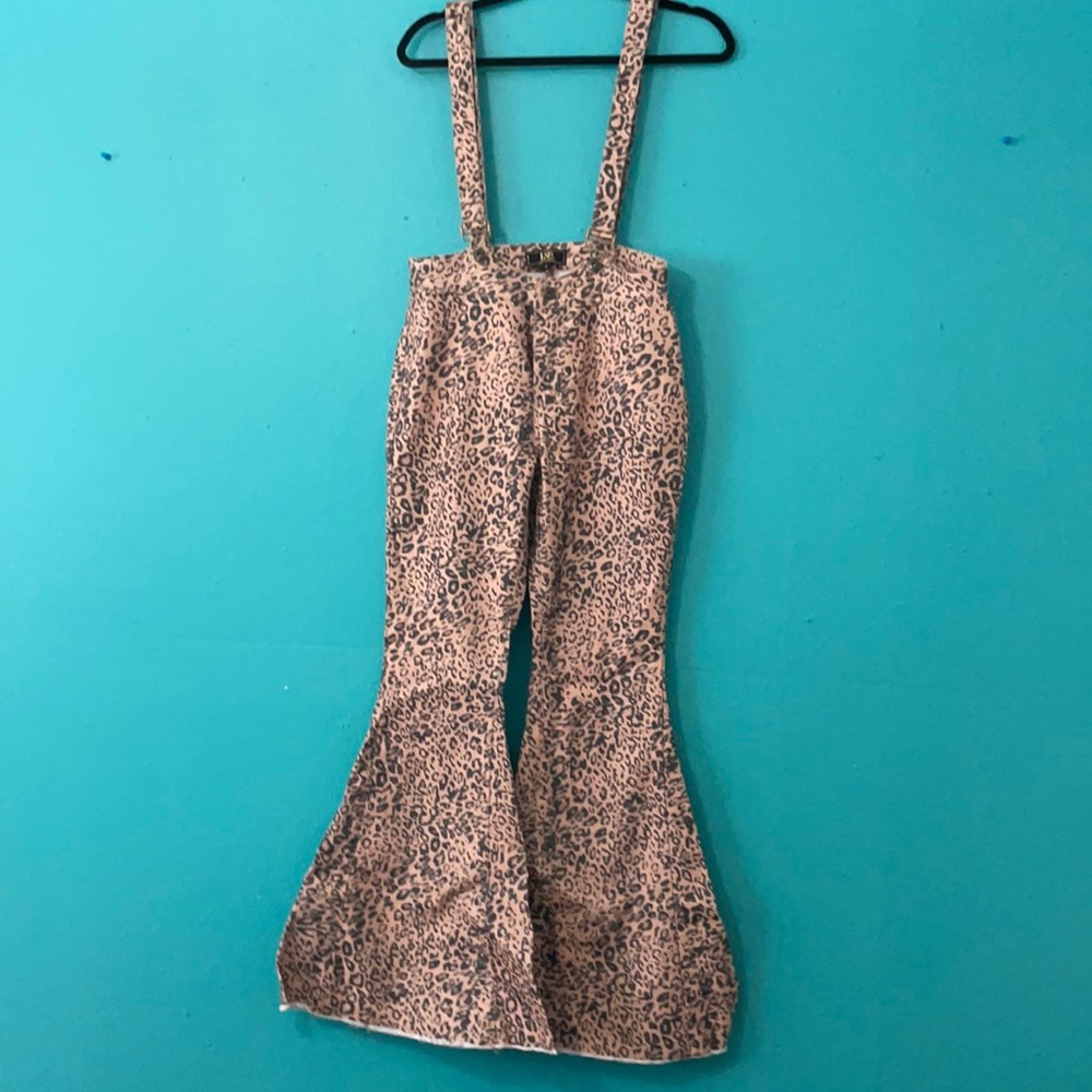Cheetah print, flare bottom overalls.